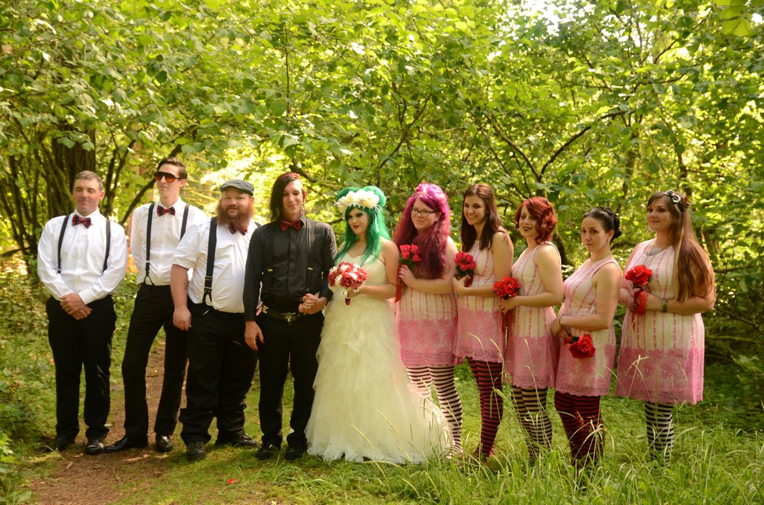 Wedding party in a forest clearing at Oxbow Regional Park