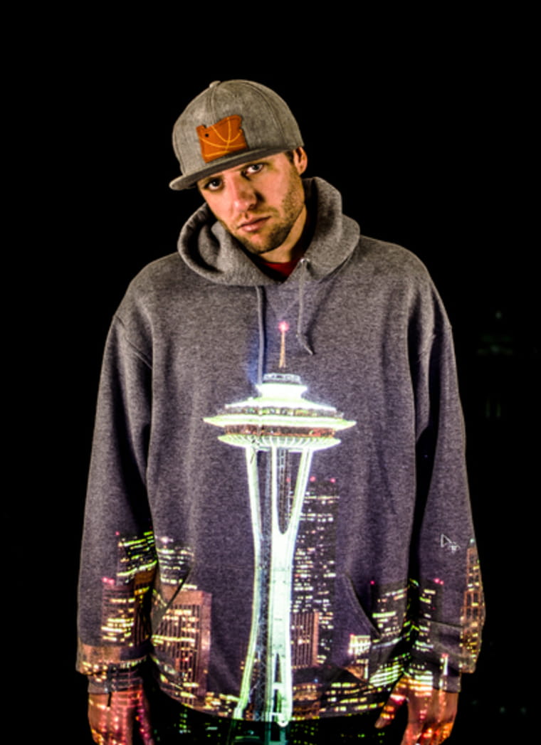 Creative portrait of man with Seattle skyline projected onto hoodie - Portland photography